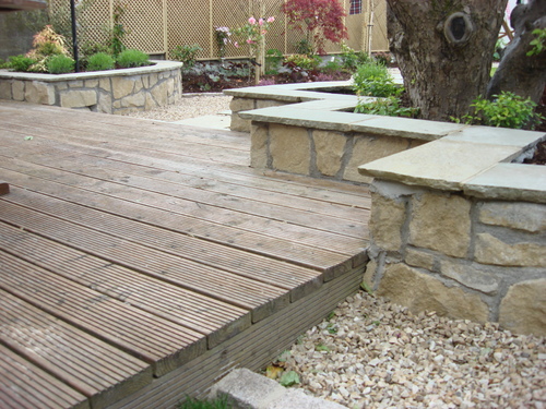 natural-stone-wall-and-decking.JPG